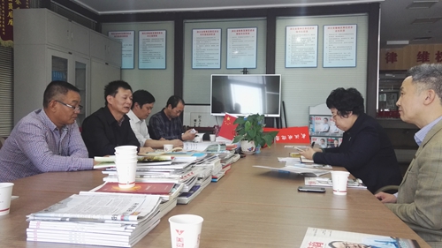 新岗村两委领导拜访楚商协会.jpg