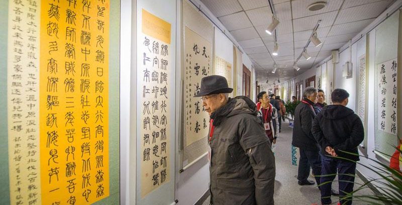 【中国日报网】武汉工程科技学院举办书法篆刻作品展